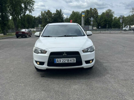 Мицубиси Лансер 2011 в Первомайском на Automoto.ua Белый Мицубиси Лансер, объемом двигателя 1.5 л и пробегом 190 тыс. км за 7000 $, фото 1 на Automoto.ua