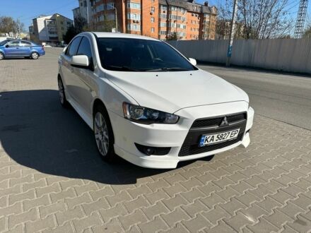 Білий Міцубісі Lancer, об'ємом двигуна 2 л та пробігом 122 тис. км за 10999 $, фото 1 на Automoto.ua