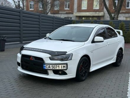 Белый Мицубиси Лансер, объемом двигателя 2 л и пробегом 225 тыс. км за 7800 $, фото 1 на Automoto.ua