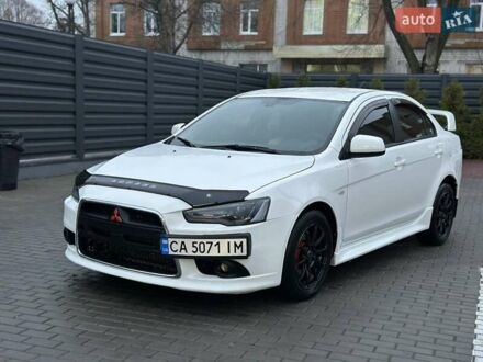 Білий Міцубісі Lancer, об'ємом двигуна 2 л та пробігом 225 тис. км за 7800 $, фото 1 на Automoto.ua