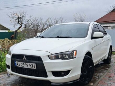 Білий Міцубісі Lancer, об'ємом двигуна 1.5 л та пробігом 163 тис. км за 6700 $, фото 1 на Automoto.ua
