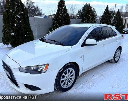 Белый Мицубиси Лансер, объемом двигателя 1.8 л и пробегом 17300 тыс. км за 6200 $, фото 1 на Automoto.ua