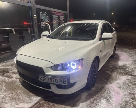 Белый Мицубиси Лансер, объемом двигателя 1.6 л и пробегом 301 тыс. км за 7000 $, фото 1 на Automoto.ua