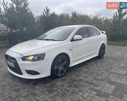 Білий Міцубісі Lancer, об'ємом двигуна 1.6 л та пробігом 231 тис. км за 6900 $, фото 1 на Automoto.ua
