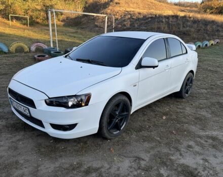Білий Міцубісі Lancer, об'ємом двигуна 1.6 л та пробігом 180 тис. км за 7700 $, фото 1 на Automoto.ua