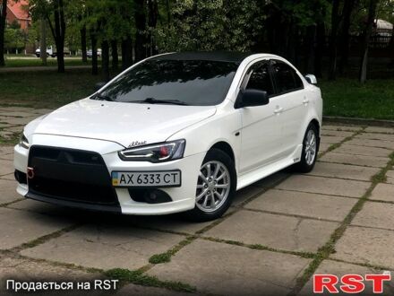 Білий Міцубісі Lancer, об'ємом двигуна 1.8 л та пробігом 169 тис. км за 8999 $, фото 1 на Automoto.ua