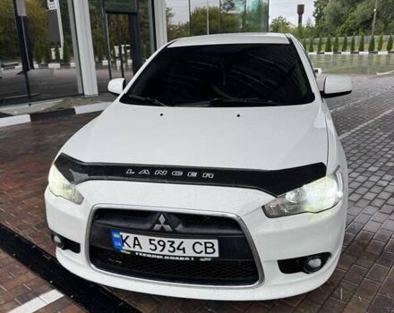 Білий Міцубісі Lancer, об'ємом двигуна 1.6 л та пробігом 219 тис. км за 7200 $, фото 1 на Automoto.ua