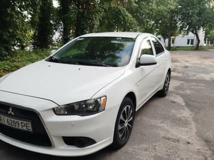 Білий Міцубісі Lancer, об'ємом двигуна 1.59 л та пробігом 232 тис. км за 7200 $, фото 1 на Automoto.ua