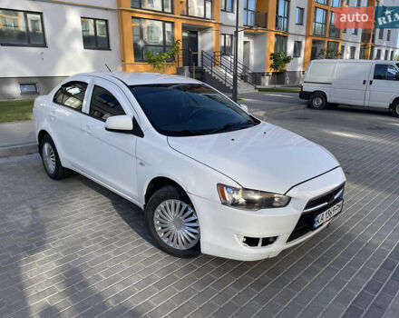 Білий Міцубісі Lancer, об'ємом двигуна 1.6 л та пробігом 205 тис. км за 4750 $, фото 1 на Automoto.ua