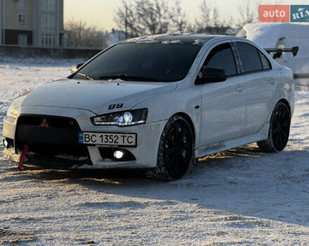 Білий Міцубісі Lancer, об'ємом двигуна 1.6 л та пробігом 232 тис. км за 6750 $, фото 1 на Automoto.ua
