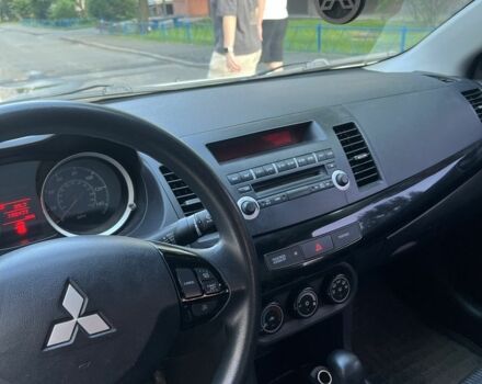 Білий Міцубісі Lancer, об'ємом двигуна 2 л та пробігом 2 тис. км за 6500 $, фото 1 на Automoto.ua