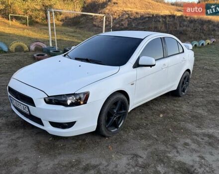 Білий Міцубісі Lancer, об'ємом двигуна 1.6 л та пробігом 180 тис. км за 7500 $, фото 1 на Automoto.ua