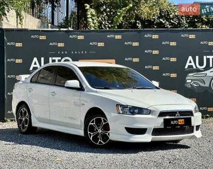 Білий Міцубісі Lancer, об'ємом двигуна 2 л та пробігом 124 тис. км за 7700 $, фото 1 на Automoto.ua