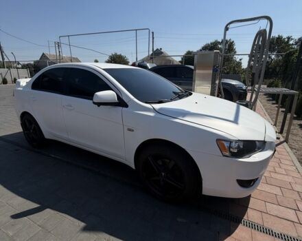 Білий Міцубісі Lancer, об'ємом двигуна 1.6 л та пробігом 182 тис. км за 6928 $, фото 1 на Automoto.ua