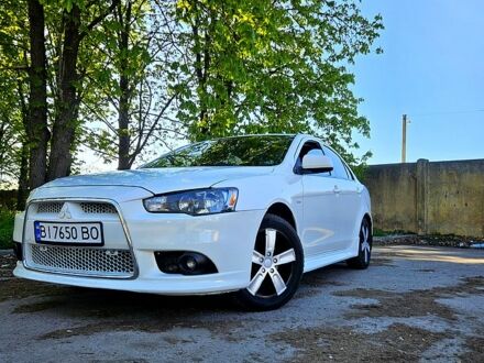 Білий Міцубісі Lancer, об'ємом двигуна 1.8 л та пробігом 183 тис. км за 6500 $, фото 1 на Automoto.ua