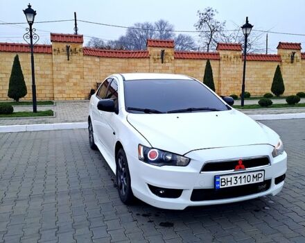 Білий Міцубісі Lancer, об'ємом двигуна 2 л та пробігом 188 тис. км за 7700 $, фото 1 на Automoto.ua