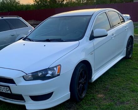 Білий Міцубісі Lancer, об'ємом двигуна 2.4 л та пробігом 232 тис. км за 7700 $, фото 1 на Automoto.ua