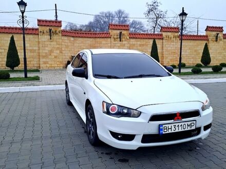 Белый Мицубиси Лансер, объемом двигателя 2 л и пробегом 188 тыс. км за 7700 $, фото 1 на Automoto.ua