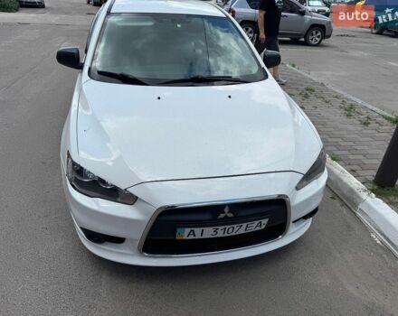Белый Мицубиси Лансер, объемом двигателя 1.6 л и пробегом 165 тыс. км за 6500 $, фото 1 на Automoto.ua