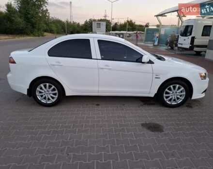 Белый Мицубиси Лансер, объемом двигателя 1.6 л и пробегом 260 тыс. км за 6500 $, фото 1 на Automoto.ua