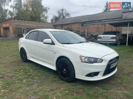 Белый Мицубиси Лансер, объемом двигателя 1.59 л и пробегом 163 тыс. км за 6700 $, фото 1 на Automoto.ua