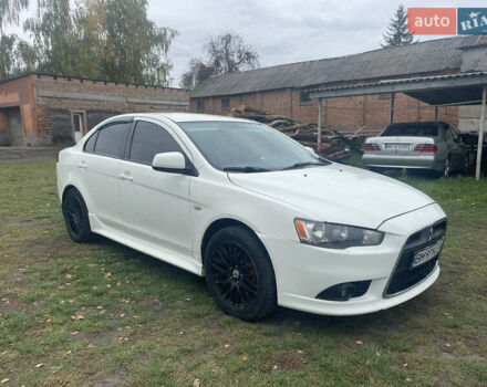 Белый Мицубиси Лансер, объемом двигателя 1.59 л и пробегом 163 тыс. км за 6700 $, фото 1 на Automoto.ua