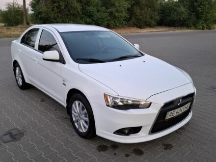 Білий Міцубісі Lancer, об'ємом двигуна 1.6 л та пробігом 260 тис. км за 6500 $, фото 1 на Automoto.ua