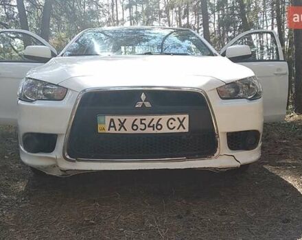 Білий Міцубісі Lancer, об'ємом двигуна 1.6 л та пробігом 155 тис. км за 9000 $, фото 1 на Automoto.ua