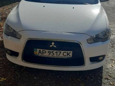 Белый Мицубиси Лансер, объемом двигателя 1.6 л и пробегом 113 тыс. км за 7500 $, фото 1 на Automoto.ua