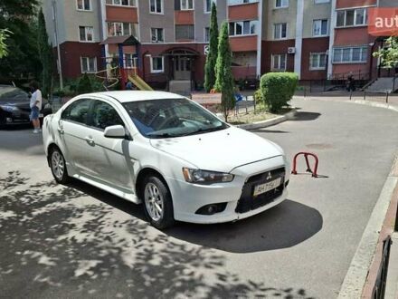 Белый Мицубиси Лансер, объемом двигателя 1.6 л и пробегом 163 тыс. км за 8000 $, фото 1 на Automoto.ua