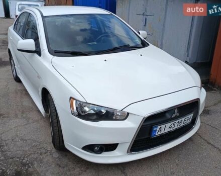 Білий Міцубісі Lancer, об'ємом двигуна 1.59 л та пробігом 112 тис. км за 10000 $, фото 1 на Automoto.ua