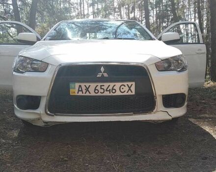 Белый Мицубиси Лансер, объемом двигателя 1.6 л и пробегом 155 тыс. км за 9000 $, фото 1 на Automoto.ua