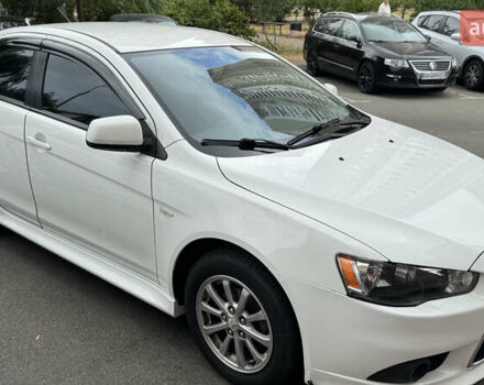 Білий Міцубісі Lancer, об'ємом двигуна 1.59 л та пробігом 69 тис. км за 9999 $, фото 1 на Automoto.ua