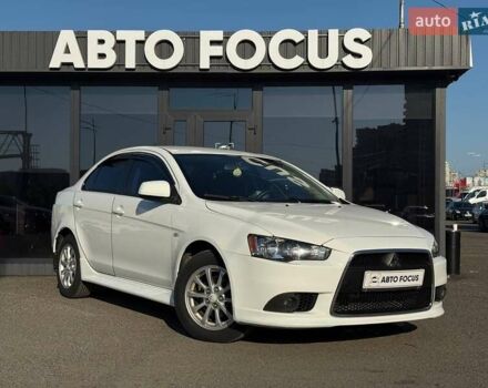 Білий Міцубісі Lancer, об'ємом двигуна 1.6 л та пробігом 69 тис. км за 9990 $, фото 1 на Automoto.ua