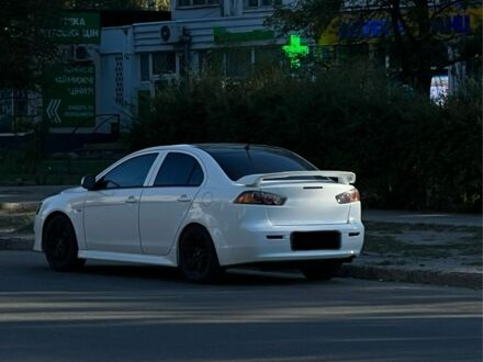 Білий Міцубісі Lancer, об'ємом двигуна 2.4 л та пробігом 208 тис. км за 7800 $, фото 1 на Automoto.ua