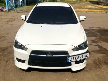 Білий Міцубісі Lancer, об'ємом двигуна 2 л та пробігом 150 тис. км за 9800 $, фото 1 на Automoto.ua