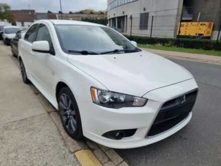 Білий Міцубісі Lancer, об'ємом двигуна 1.8 л та пробігом 82 тис. км за 8800 $, фото 1 на Automoto.ua