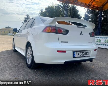 Белый Мицубиси Лансер, объемом двигателя 2 л и пробегом 132 тыс. км за 9200 $, фото 1 на Automoto.ua