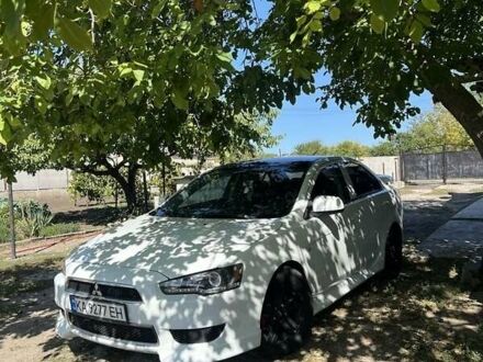 Білий Міцубісі Lancer, об'ємом двигуна 2.4 л та пробігом 208 тис. км за 7500 $, фото 1 на Automoto.ua