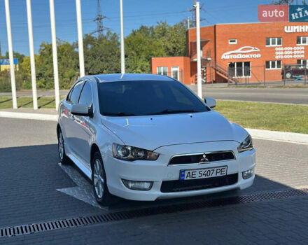 Білий Міцубісі Lancer, об'ємом двигуна 2 л та пробігом 165 тис. км за 8500 $, фото 1 на Automoto.ua