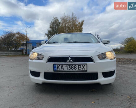 Білий Міцубісі Lancer, об'ємом двигуна 2 л та пробігом 131 тис. км за 9000 $, фото 1 на Automoto.ua
