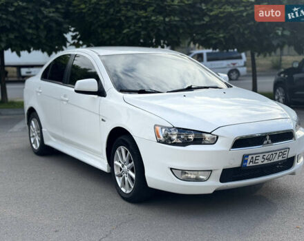 Білий Міцубісі Lancer, об'ємом двигуна 2 л та пробігом 165 тис. км за 8500 $, фото 1 на Automoto.ua