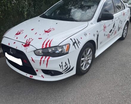 Білий Міцубісі Lancer, об'ємом двигуна 2 л та пробігом 233 тис. км за 8100 $, фото 1 на Automoto.ua