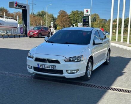 Белый Мицубиси Лансер, объемом двигателя 2 л и пробегом 113 тыс. км за 8500 $, фото 1 на Automoto.ua
