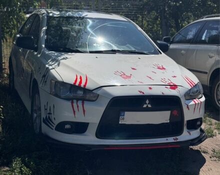 Білий Міцубісі Lancer, об'ємом двигуна 2 л та пробігом 233 тис. км за 8000 $, фото 1 на Automoto.ua