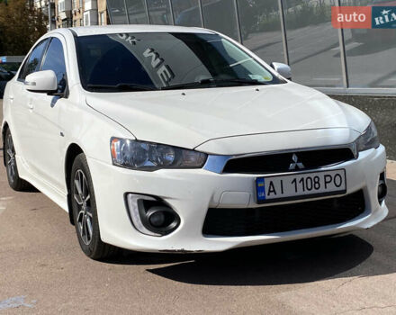 Білий Міцубісі Lancer, об'ємом двигуна 2 л та пробігом 291 тис. км за 8900 $, фото 1 на Automoto.ua