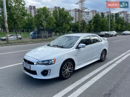 Белый Мицубиси Лансер, объемом двигателя 2.36 л и пробегом 87 тыс. км за 9000 $, фото 1 на Automoto.ua