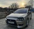 Бежевый Мицубиси Лансер, объемом двигателя 2 л и пробегом 180 тыс. км за 5300 $, фото 1 на Automoto.ua
