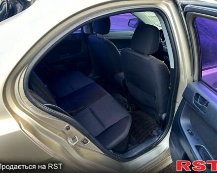 Бежевий Міцубісі Lancer, об'ємом двигуна 1.8 л та пробігом 154 тис. км за 6300 $, фото 9 на Automoto.ua