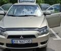 Бежевий Міцубісі Lancer, об'ємом двигуна 1.8 л та пробігом 234 тис. км за 5700 $, фото 1 на Automoto.ua
